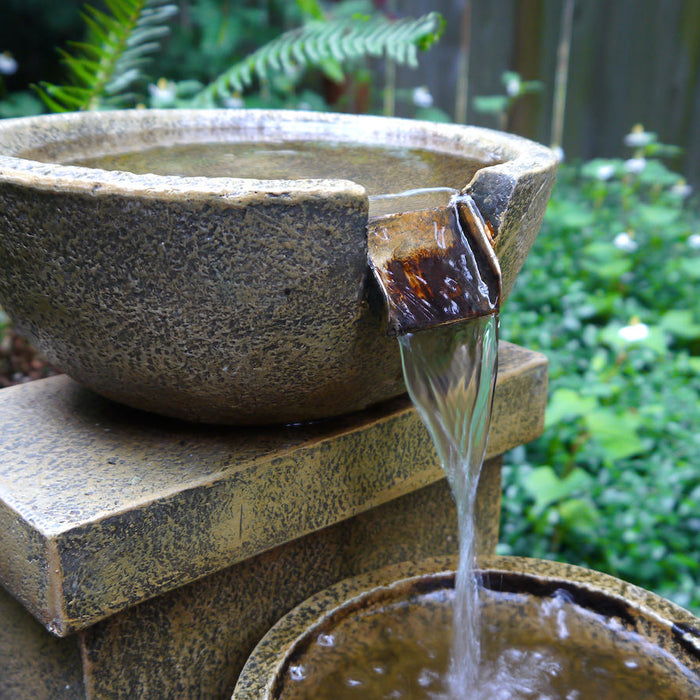 fountain bowl flowing water