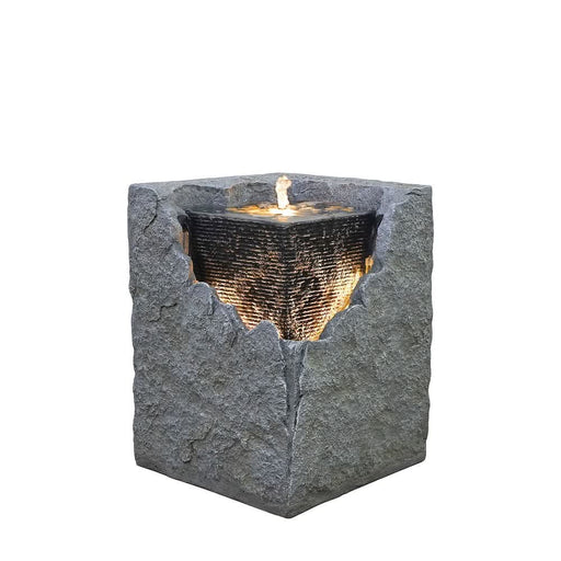 A water feature with a square cube design.