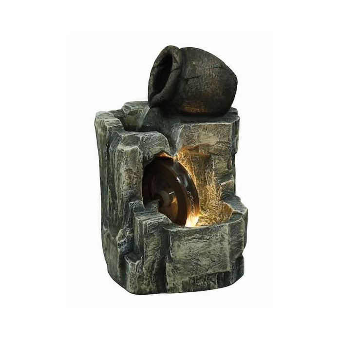 A tabletop fountain with a water wheel.