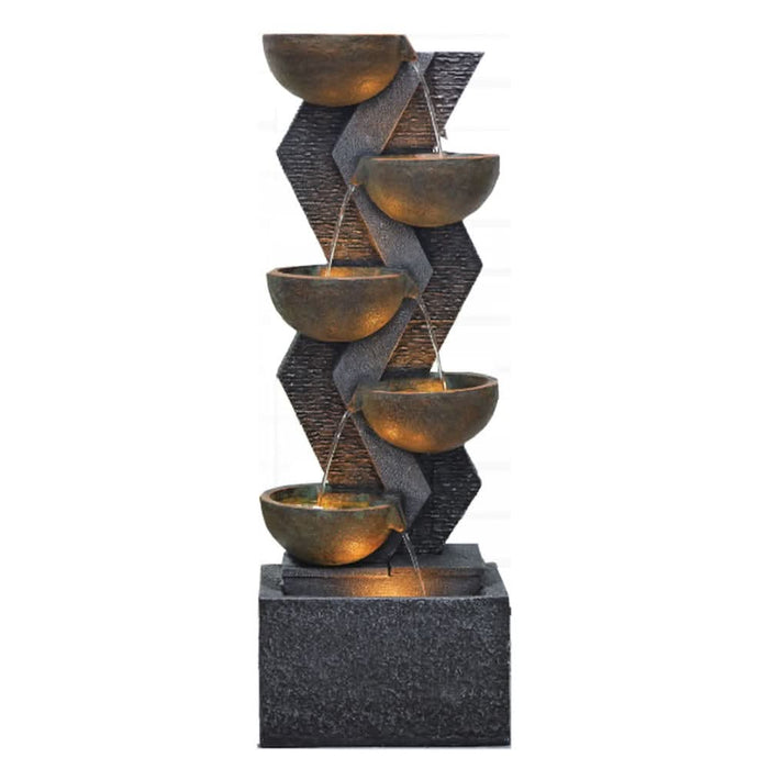 Tall wall fountain with 6-tiers of water flow.