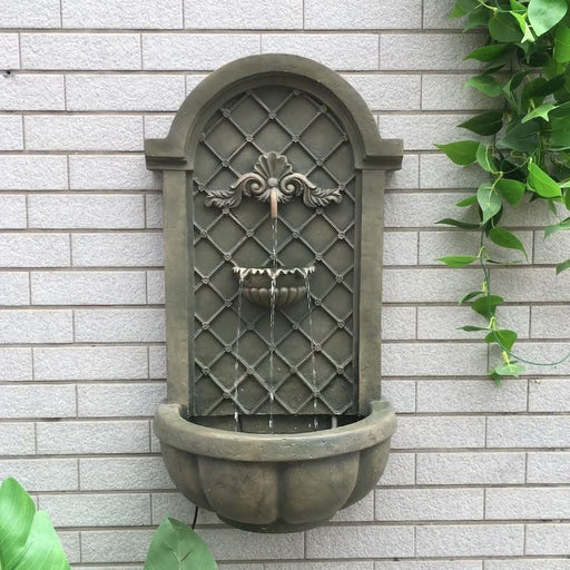 Italian-inspired wall fountain.