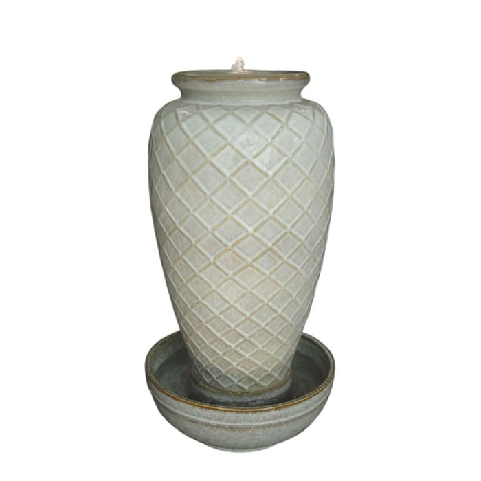 A tall vase fountain in ivory white.