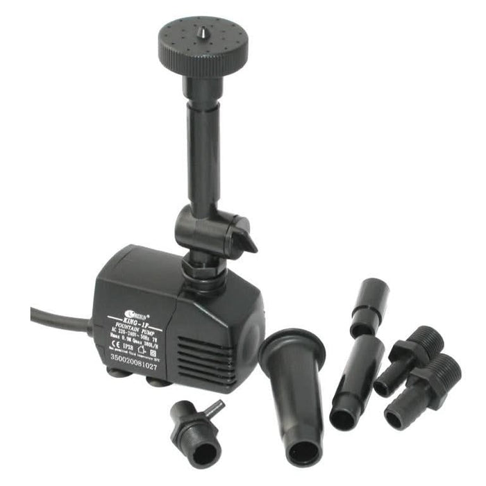 A water pump with fittings attached.