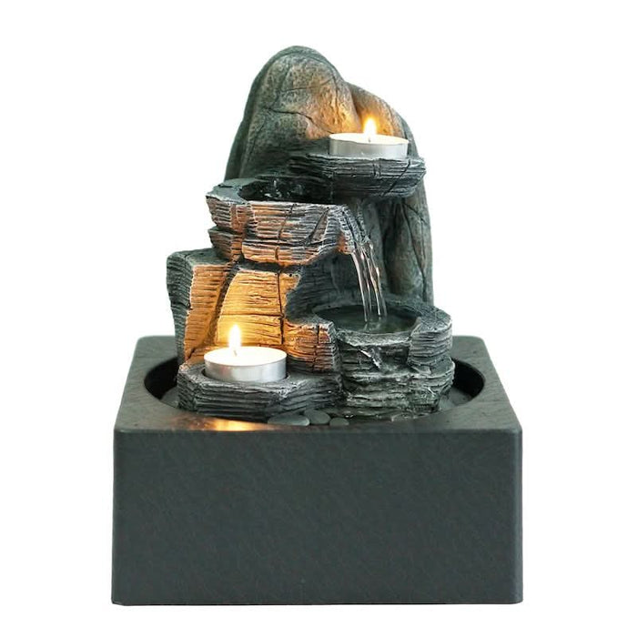 A rock-designed tabletop water feature.