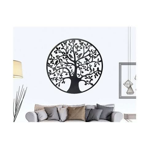 Metal wall art with tree design hung in living room.