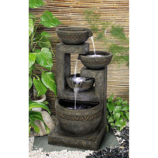A water feature with 4 bowls.