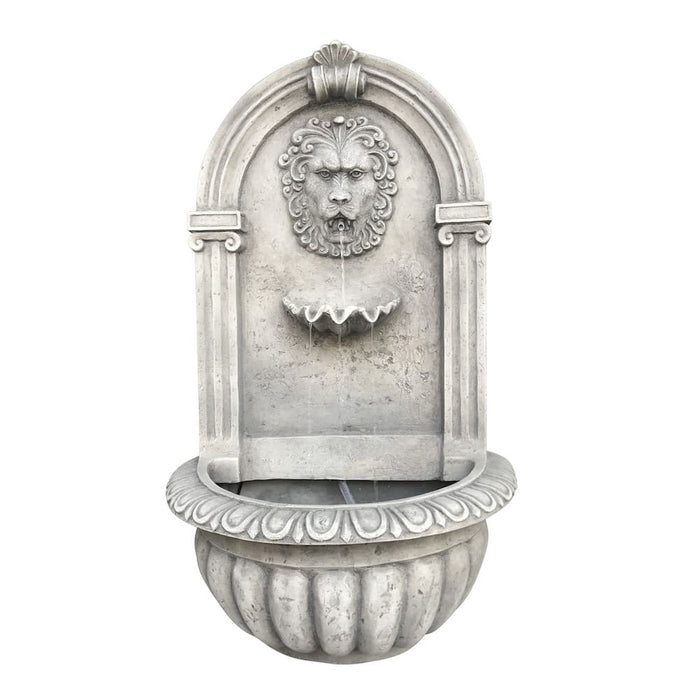 Wall fountain with lion head in antique white.