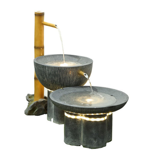 Two-bowl water fountain with bamboo tap.