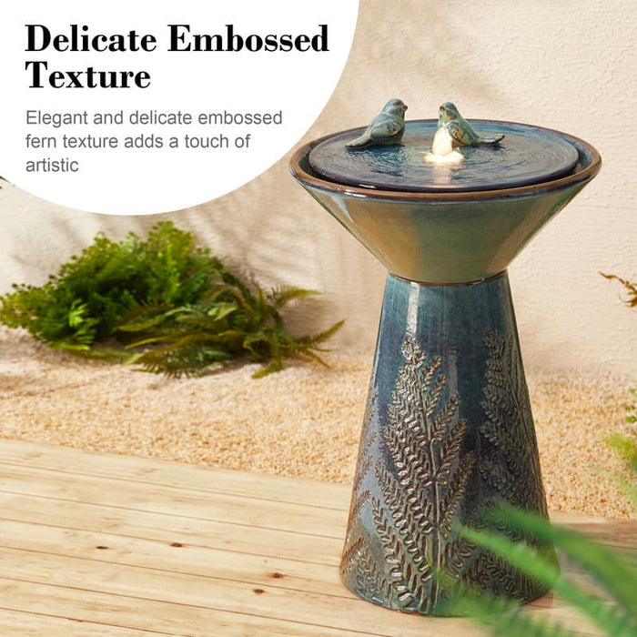 Features of an abstract ceramic birdbath fountain.