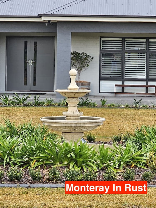 Close up of the Monteray concrete fountain in rust.