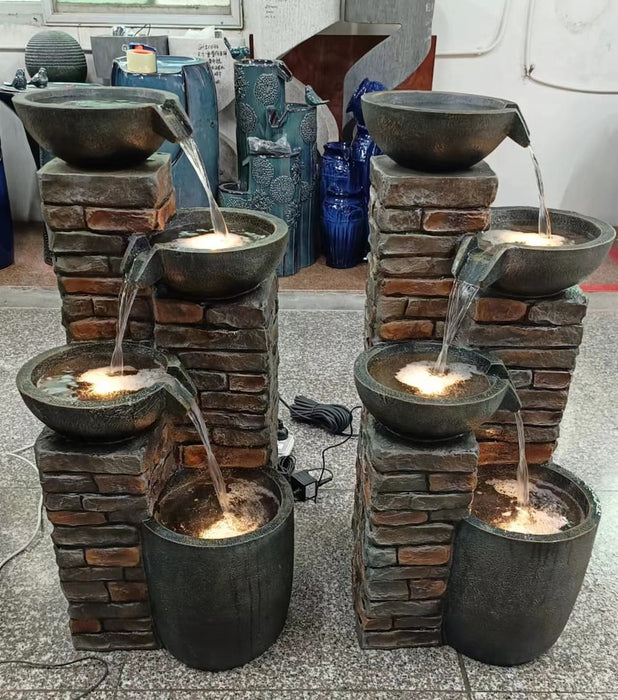 A 4-pots fountain with water flow.