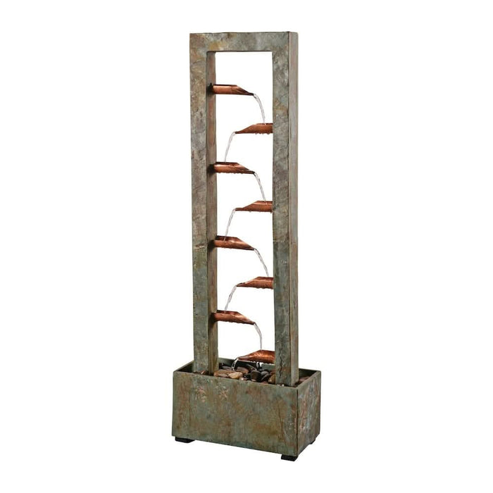 Tall slate water fountain with multiple copper spouts cascading water into a stone-filled base.