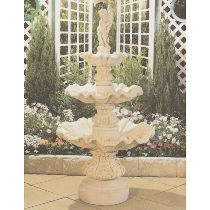 A 3 tier concrete fountain with cherub.