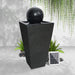 A black solar water feature with ball.